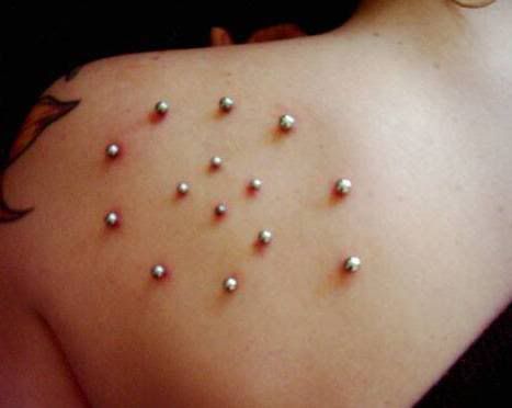 More examples of surface piercings for those who are not "in the know"(not 