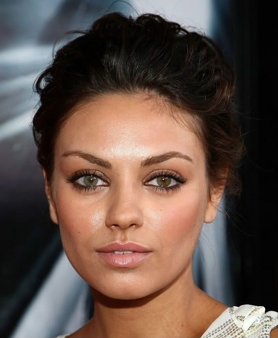 Mila Kunis is such a vision in white Her upswept hair lets her eyes be the 